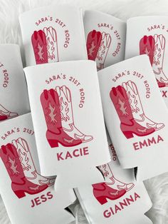 six red and white coasters with cowboy boots on them are sitting on a furry surface