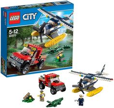 a lego city set with an airplane and firetruck in the box next to it