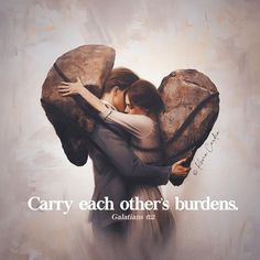 two people hugging each other with the words carry each other's burdens on them