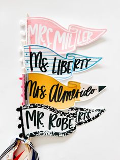 three different colored paper cutouts with writing on them, one is for mr and mrs miller