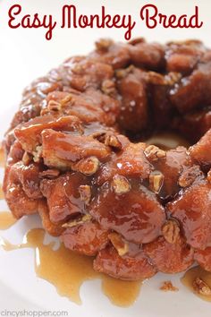 a close up of a bundt cake on a plate with caramel drizzle