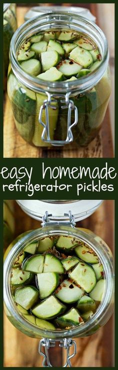 two glass jars filled with pickles sitting on top of a wooden table