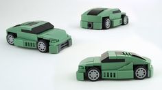 three green toy cars sitting next to each other