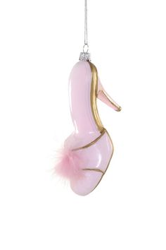 a pink shoe ornament hanging from a chain