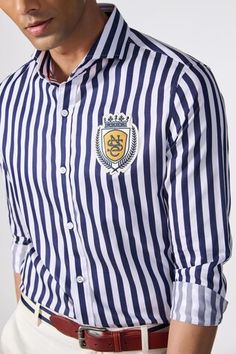 Navy sartorial shirt featuring all-over contrasting stripes and SNCC patch logo. - Aza Fashions Blue Shirt With Signature Stripes For Work, Blue Cotton Shirt With Signature Stripes, Blue Cotton Shirt With Striped Cuffs, Men Shirts Casual, Pattern Shirt, Men Shirts, Logo Pattern, S N, Cuff Sleeves