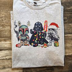 Cute Design ! Custom Made And Will Ship Within A Few Days! On Gildan Unisex Short Sleeve Sublimation Check Out My Page For More Designs Star Wars Christmas Shirts, Starwars Christmas, Star Wars Christmas, Popular Color, Cute Design, Unisex Shorts, Christmas Shirt, Christmas Shirts, Cute Designs