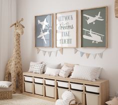 a room with white walls and wooden shelves filled with stuffed giraffes on the wall