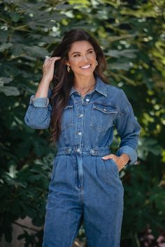 A one stop shop denim must have for fall! Pair with heels or a pair of sneakers and switch up the vibe with this versatile piece! Before you buy: True to size Relaxed pleated denim style You can cuff the bottom Fall Denim Jumpsuits And Rompers In Medium Wash, Chic Medium Wash Jumpsuits And Rompers For Fall, Chic Medium Wash Jumpsuit For Fall, Chic Denim Jumpsuits And Rompers For Fall, Chic Medium Wash Denim Jumpsuit With Long Sleeves, Casual Fall Denim Jumpsuit In Medium Wash, Fall Button-up Relaxed Fit Jumpsuits And Rompers, Fall Button-up Medium Wash Denim Jumpsuit, Fall Button-up Jumpsuits And Rompers In Relaxed Fit