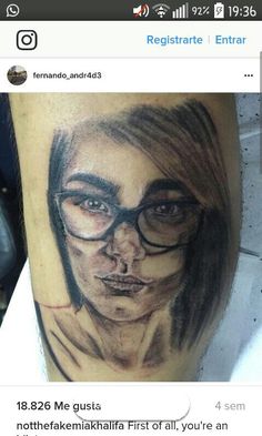 a woman's face with glasses on her leg is seen in this tattoo photo