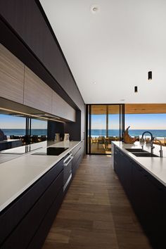 a large kitchen with an ocean view is featured in the ad for interest magazine