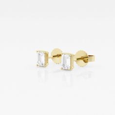 There's nothing more versatile than a pair of classic stud earrings. We love these princess cut lab grown diamond studs for every occasion, be it zoom meetings, brunch with friends or quiet evening dinner with your beau. Pick the size and color best suited to your ears in the color of gold that you fancy. Quiet Evening, Evening Dinner, Solitaire Studs, Emerald Diamond, Diamond Solitaire, Diamond Studs, Princess Cut, Emerald Cut, Diamond Shapes