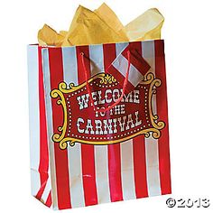 a red and white striped bag that says welcome to the carnival