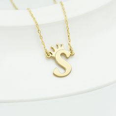 Personalized Initial with Crown Necklace - 925 Sterling Silver Necklace - Dainty Crown Letter Necklace - Gold Jewelry - Christmas Gift * High quality Handmade Sterling Silver item * Yellow, Rose and Silver as color options * Rose gold and Gold items come as Rose gold or Gold plated over the 925 Sterling Silver * The necklace pendant height is 0.9 inches. * All items will be shipped in a gift box * Special gift for Christmas. Best discounts for Christmas. * Please check out our shop https://www.e Sterling Silver Name Jewelry For Christmas, Hallmark Necklace For Christmas And Anniversary, Quality Assured Necklace For Christmas Anniversary, Hallmarked Jewelry For Personalized Christmas Gift, Hallmarked Necklaces For Birthday And Mother's Day, Sterling Silver Personalized Jewelry Gift For Christmas, Sterling Silver Jewelry For Birthday And Christmas, Sterling Silver Jewelry For Personalized Christmas Gift, Silver Necklace For Birthday And Christmas