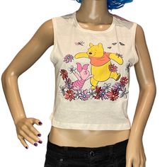 Disney Winnie The Pooh + Piglet Too Cropped Crop Tank Top It Is New With Tags Size Large Approximate Measurements: 17.75" Across From Underarm To Underarm 16.5" Overall Length From Top Of Back Mid-Collar To Bottom Hem Sleeveless Cropped Length Shirt Color Is Cream With A Graphic Of Pooh And Piglet Frolicking Amid Beautifully Embroidered Multi-Colored Flowers, Bees, And Dandelions Material Content Is 60% Cotton, 40% Polyester Smoke-Free Home Bbl1-P014175 Tank Top Embroidery, Winnie The Pooh Piglet, Pooh And Piglet, Top Embroidery, Pooh Piglet, Multi Colored Flowers, Colored Flowers, Crop Tank Top, Disney Winnie The Pooh