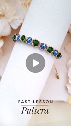 an image of a ring with stones on it and flowers in the background, that reads fast lesson pulsera