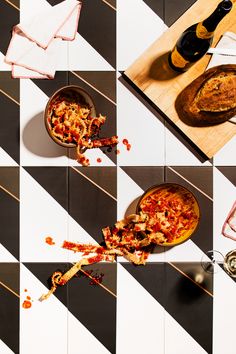 four different views of food being served in bowls and spoons on a checkered table