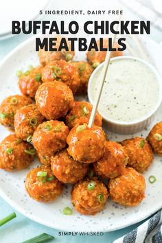 buffalo chicken meatballs on a plate with dipping sauce