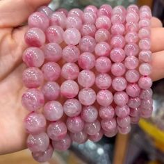 Material:pink rhodonite beads size :7-12.5mm quantity: one strand 6mm approx 29 pcs one strands 7mm approx25 pcs one strands 8mm approx 22 pcs one strands 9mm approx 21pcs one strands 10mm approx 19 pcs one strands 11mm approx 18pcs one strands 12mm approx 16 pcs one strands 13mm approx 16 pcs one strands 14mm approx 15 pcs one strands 15mm approx 14pcs one strands 16mm approx 14 pcs one strands 17mm approx 13pcs one strands 18mm approx 13pcs one strands 19mm approx 12pcs one strands 20mm approx Pink Hand-strung Crystal Bracelet, Pink Hand-strung Round Crystal Bracelet, Pink Rose Quartz Round Beaded Bracelets, Pink Round Spiritual Beaded Bracelets, Pink Bracelets With 8mm Round Beads, Pink Round Beads Crystal Bracelet For Spiritual, Pink Round Beads Crystal Bracelet Spiritual, Pink Gemstone Beads Bracelets, Pink Gemstone Beads Bracelets With Round Beads