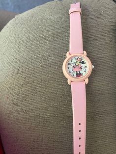 Minnie Mouse watch from mid 80's needs a battery still has original watch band on the watch. Great condition. Spring Pink Minnie Mouse Sets, 1970 Vintage Cast Iron Minnie Mouse Green Clothing Necklace, Disney Pink Minnie Mouse T-shirt, Mickey Mouse Watch, Minnie Mouse Pink Amazon.com, Electronic Toys, Leather Watch, Watch Bands, Minnie Mouse