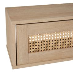 a close up of a wooden object with holes in it's side panel and an inner drawer