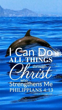 a dolphin swimming in the ocean with a bible verse