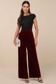 The Lulus Chic Splendor Wine Red Velvet Pleated High-Rise Wide-Leg Pants are our new favorite winter wardrobe piece! Plush velvet shapes these fabulous pants with a high, banded waist that features belt loops and a hidden zip fly with an internal top clasp closure. Pleated details, diagonal front pockets, and decorative back welt pockets accent the wide pant legs that end at full-length hems. Fit: This garment fits true to size. Length: Floor length. Size medium Inseam: 31.00 Front Rise: 13.50 W Red Velvet Pants Outfit, Velvet Pants Outfit, Red Velvet Pants, Winter Skirt, Red Pants, Velvet Pants, Wide Pants, Bottom Clothes, Wine Red