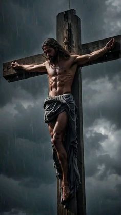 jesus on the cross with dark clouds in the background