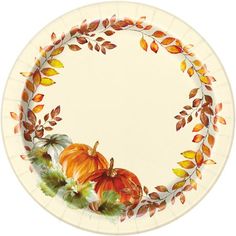 a paper plate decorated with autumn leaves and pumpkins on the rim is shown in front of a white background