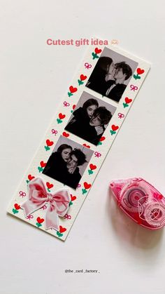 a couple's photo on a ribbon next to a pink lollipop candy