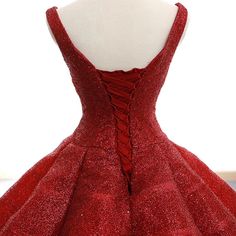 a red dress on a mannequin headdress