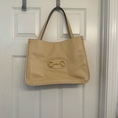 Nwt Cream Colored Gucci Horsebit Leather Tote With Gold Hardware. Comes With Original Dustbag, No Box (Didn’t Come With Box When I Bought It At The Gucci Outlet In Ny). If You Search On Google The Prices For Gucci Horsbit Tote, You Will Be Pleasantly Surprised. The Price I’m Selling It For Is Very Competitive Especially As This Is In Absolute New Condition! Buyer Chaged Her Mind Last Minute, Nothing Wrong With This Item. Pls Be Aware That This Is An Authentic Item, Will Go Through Pm Hq For Auth Formal Beige Shoulder Bag With Horsebit Detail, Gucci Beige Shoulder Bag For Office, Gucci Bags With Metal Hardware For Work, Classic Beige Shoulder Bag With Horsebit Detail, Beige Shoulder Bag With Horsebit Detail For Everyday, Designer Shoulder Bag With Horsebit Detail For Shopping, Designer Shoulder Bag With Horsebit Detail, Elegant Shoulder Bag With Horsebit Detail For Shopping, Beige Rectangular Shoulder Bag With Horsebit Detail