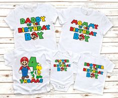 two baby onesuits with mario and luigi on them, one has the number four