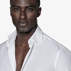 Meticulously crafted with ultra-fine stitching and soft interlining in the cuffs and classic collar, this classic white shirt featuring a fine stripe for some understate pattern. Classic White Shirt, Slim Fit Shirt, Egyptian Cotton, Casual Wardrobe, Classic White, Fashion Advice, White Shirt, Workout Shirts, The White