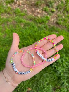 New Kids on the Block friendship bracelets. This is a set of three (3) bracelets.  The "Donnie's Girl" bracelet can be changed to any name. Just specify at checkout and/or send me a message.  The pink bracelet glows in the dark! Check back for more collections.  Stretch bracelets made of glass, acrylic, wood, and other fine materials.  Customization available, just send me a message! Personalized Multicolor Friendship Bracelets For Summer, Trendy Personalized Friendship Bracelets For Summer, Trendy Personalized Summer Friendship Bracelets, Personalized Multicolor Summer Friendship Bracelets, Summer Personalized Multicolor Friendship Bracelets, Personalized Friendship Bracelets For Summer, Personalized Pink Beaded Bracelets For Festival, Personalized Pink Bracelets For Festival, Personalized Pink Beaded Festival Bracelets