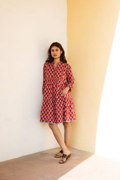 "🌺  ADYA Blending style and  comfort is what we love the most, making for a truly memorable journey for a woman who wants it all.  The Adya dress is one of our favourite holiday must haves from our new collection.  Striking colours of red is sure to raise your vibration and usher in calmness. Sizings Size S : Shoulders 37cm - 14.5\"   Bust 96cm - 37.7\" Waist 102cm - 40.1\" Length approx. 98cm - 38.5\"   Size M : Shoulders 38cm - 14.9\"   Bust 100cm - 39.3\" Waist 104cm - 40.9\" Length approx. Casual Summer Tunic With Printed Motifs, Traditional Beach Dresses With Printed Motifs, Bohemian Kalamkari Print Summer Dress, Red Cotton Tunic For Summer, Red Block Print Summer Dress, Summer Beach Kurta With Printed Motifs, Red Cotton Straight Kurta Dress, Beach Tunic Dress With Printed Motifs, Summer Ikat Print Tunic Kurta