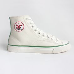 This Classic PF Flyers model was named after legendary Boston Celtic basketball player and member of the NBA 75, Bob Cousy. Cousy originally laced up this canvas style in 1957, and now they're back with a modernized look. Based on one of PF Flyers' best sellers from the 1960's, the All American features vintage detailing and honors a tradition rooted in comfort. Inspired for the court and designed for long lasting comfort. Signature Bob Cousy Patch Flat cotton laces Canvas upper for a lightweigh Retro High-top Sneakers With Embroidered Logo, Vintage Low-top Sneakers With Embroidered Logo, Retro White Canvas Shoes, White Retro Canvas Shoes, Sporty Cotton Canvas Shoes With Embroidered Logo, Cotton High-top Sneakers With Embroidered Logo, White Cotton Canvas Shoes With Embroidered Logo, Lace-up High-top Sneakers With Embroidered Logo, Retro Cotton High-top Sneakers With Gum Sole