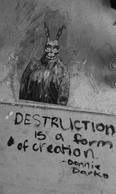 graffiti on the side of a building with an image of a bird and caption that reads destruction is a form of creation