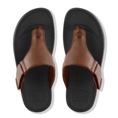 Casual. Classic. Out-of-this-world comfortable. It's little wonder these ergonomically engineered Trakk II leather flip flops are perennial bestsellers. Handsome, fuss-free leather uppers sit on our pressure-diffusing, biomechanist-developed microwobbleboard midsoles. They're adjustable. Lightly padded. Pretty much perfect. Leather Flip Flops, Dark Tan, Pretty Much, Mary Jane Sneaker, Top Shoes, Leather Men, Flip Flops, Leather Upper, Wonder