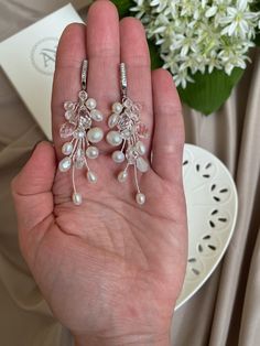 This amazing bridal earrings make a beautiful statement piece. Here you can find : wedding earrings: https://www.etsy.com/shop/AtmanRay/edit?ref=edit_trust_header&section_id=30037784 bridal hair combs: https://www.etsy.com/your/shops/AtmanRay/tools/listings/section:34235899 bridal hair vines: https://www.etsy.com/your/shops/AtmanRay/tools/listings/section:34454797 bridal hair pines: https://www.etsy.com/your/shops/AtmanRay/tools/listings/section:34666265 wedding hair bands: https://www.etsy.com/ Delicate Sterling Silver Bridal Earrings For Party, Elegant Handmade Cluster Earrings For Formal Occasions, Handmade Elegant Cluster Earrings For Formal Occasions, Delicate Formal Bridal Earrings, Elegant Wedding Cluster Earrings With Ear Wire, Delicate Formal Bridal Earrings With Ear Wire, Delicate Ear Wire Bridal Earrings For Formal Occasions, Delicate Sterling Silver Cluster Earrings For Wedding, Handmade Clip-on Earrings For Wedding