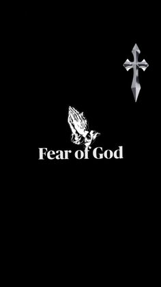 a black background with the words fear of god and an image of a cross on it