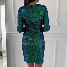 FREE SHIPPING Women Deep V-Neck Sequin Mini Bodycon Dress JKP3475 Fitted Green Sequined Bodycon Dress, Glamorous Green Bodycon Dress For Party Season, Green Sequin Bodycon Mini Dress, Green Mini Bodycon Dress For Party Season, Sequin Sheath Bodycon Dress For Date Night, Sequin Sheath Bodycon Dress For Party Season, Green Sequined Bodycon Dress, Fitted Knee-length Sequin Dress For Night Out, Green Knee-length Sequin Mini Dress