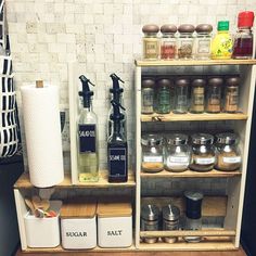 an assortment of spices and condiments on shelves