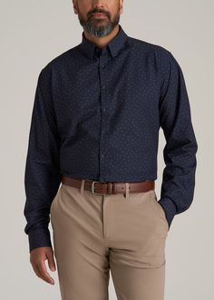 About Our Extra-Long Men's Shirt Reliable and versatile, you can wear this traveler shirt for tall men on any trip, to any meeting, with any outfit. Made of a polyester and spandex blend, it's as comfortable as your favorite tee with the class of a formal dress shirt. It has just the right amount of stretch so you can take it anywhere, whether you're catching flights or taking a big meeting in the boardroom. You want to feel confident in the fit and style of your clothes, which can be hard if yo Casual Navy Long Sleeve Dress Shirt, Navy Casual Shirt For Business, Casual Navy Dress Shirt For Work, Formal Dress Shirt, Catching Flights, Scrubs Dress, Cozy Sleepwear, Tall Dress, Formal Shirt Dress