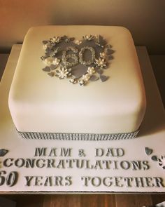 a 50th birthday cake for a man and his wife