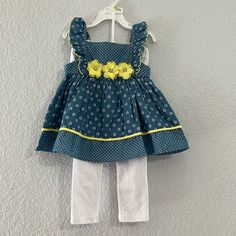 Kids Headquarters Polka Dot Floral Dress 2 Pc Set Blue White With Yellow Polka Dot Print Floral Print Sleeveless Yellow Floral Rosettes Dress With Matching White Leggings Two Piece Set New Without Tags - Will Come With Hanger Size 4t 2b Cute Polka Dot Sets For Spring, Cute Polka Dot Spring Sets, Spring Cotton Polka Dot Sets, Spring Cotton Sets With Polka Dot, Polka Dot Cotton Sets For Spring, Spring Polka Dot Cotton Sets, Spring Cotton Sets In Polka Dot, Playful Polka Dot Sets For Spring, Playful Polka Dot Spring Sets