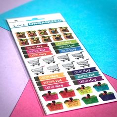 the planner stickers are colorful and have plants in baskets on them, along with other items