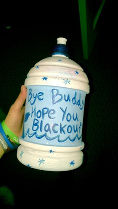 a hand holding a water bottle with writing on it that says bye buddy hope you blackout