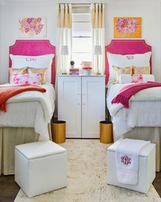 two white beds with pink headboards and footstools in a bedroom area next to a window