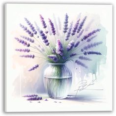 a vase filled with purple flowers on top of a table