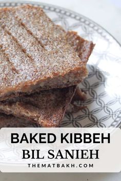 baked kibbeh bil sanieh on a plate with text overlay